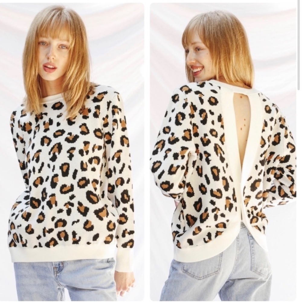 - Leopard cross back sweater size large